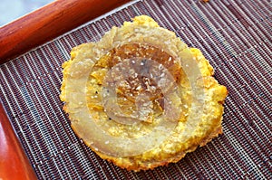 Fried plantain tostones (patacones)