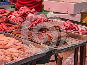 Fried Pork belly and raw pork in the chinese Fresh market at changsha city