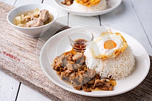 Fried Pork with Garlic, Pepper and fried egg on rice. Easy thai food