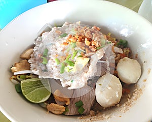 fried pork with meat ball, dry noodle