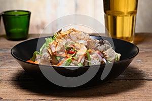 Fried Pork Spare Ribs With Garlic And Pepper Mix With Spicy Salad In Bowl