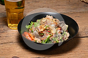 Fried Pork Spare Ribs With Garlic And Pepper Mix With Spicy Salad In Bowl