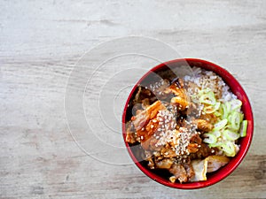 Fried Pork with sweet sauce on top of rice bowl - Japanese style
