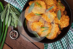 Fried potato pancakes in a frying pan