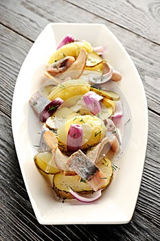 Fried potato and pickled herring