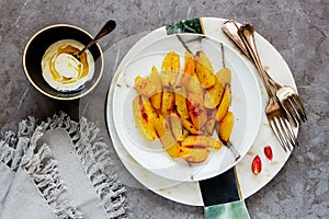 Fried potato wedges
