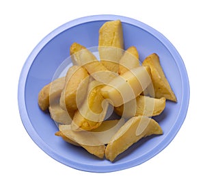 Fried potato wedges on a plate. fried potato veggies isolated on white background. food top view