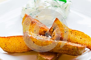 Fried potatoes with creamy dip