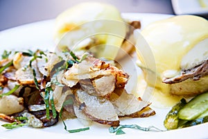 Fried Potatoes and Eggs Benedict