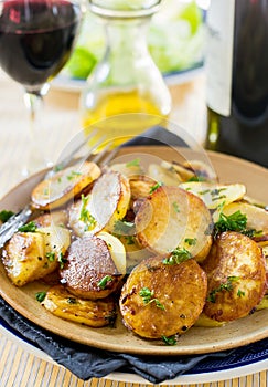 Fried potatoes with goose duck grease and parsley