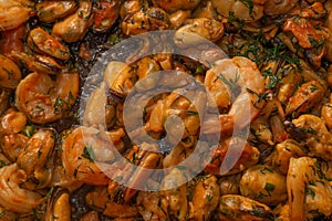 Fried prawns and mussels. grilled seafood close up