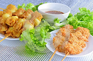 Fried quail egg wrapped in wanton sheet and fried chicken