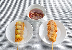 Fried quail egg wrapped in wanton sheet and fried chicken