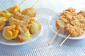 Fried quail egg wrapped in wanton sheet and fried chicken