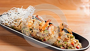Fried rice with calamari - asian food. chaufa rice with shrimp photo