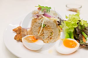 Fried rice with chili dip served with boiled egg a