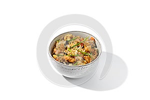 Fried rice with egg, chicken and vegetables isolated on white background. Traditional chinese food - fried rice with chicken meat