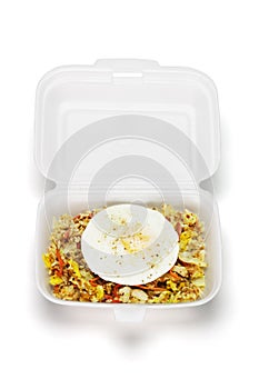 Fried rice with egg in open Styrofoam box