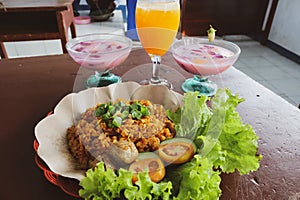 Fried rice, orange juice and fruit soup ice for lunch