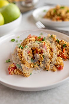 Fried rice with scrambled eggs and vegetables. Cooked with whole grain or brown rice.