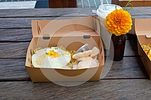Tasty Fried Rice with Egg in Paper Box photo