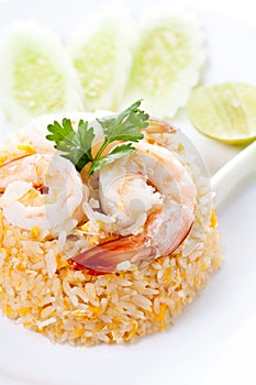 Fried rice with shrimp and vegetables on white plate