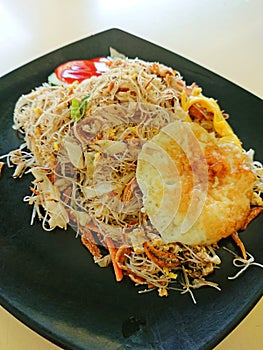 Fried rice vermicelli Muslim style ikan bilis fried Bee hoon photo