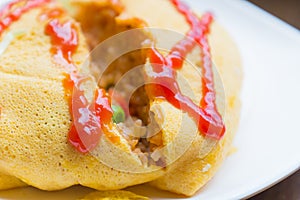 Fried rice wrapped with omelette