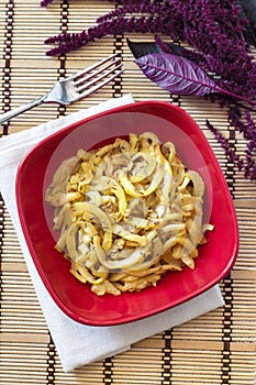 Fried ripe zucchini with cumin seeds