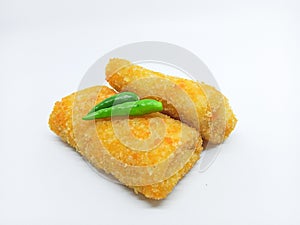 Fried Risoles or Risol Mayo (Traditional food) with a chili isolated on the white background