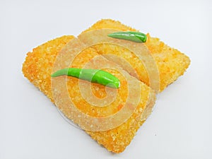 Fried Risoles or Risol Mayo (Traditional food) with a chili isolated on the white background