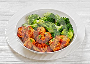 fried salmon bites with steamed broccoli florets