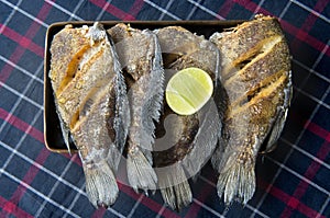 Fried salted dried damsel fish.