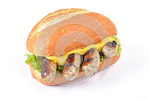 Fried sausages in a roll