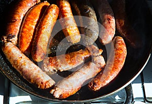 Fried sausages sausages black pudding and chorizo