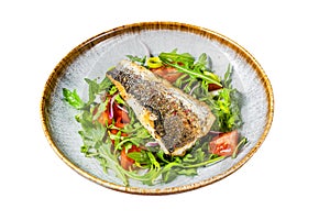 Fried sea bass fillet with vegetable salad, Dicentrarchus fish. Isolated on white background.