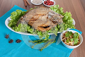 Fried sea perch topped with savory fish sauce menu