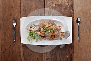 Fried Seabass with garlic,On table