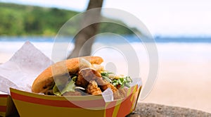 Fried shark and bake fast food outdoors by the beach at Maracas Bay in Trinidad and Tobago