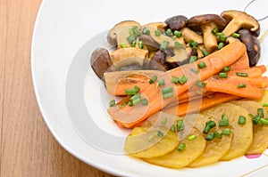 Fried Shiitake mushroom, carrot and potato with butter sauce