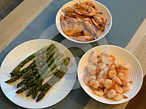 Fried shrimp and aspargus top view