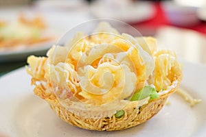 Fried shrimp salad cream serve on flour basket for food background.