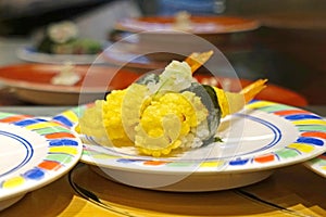 Fried shrimp sushi, seaweed paper in Japan restuarant