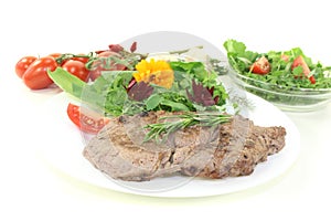 Fried Sirloin steak with wild herb salad