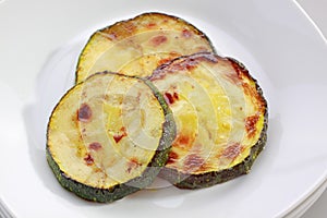 Fried slices of courgette photo