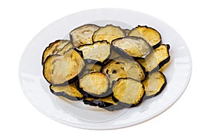 Fried slices of eggplant in glass plate isolated on white