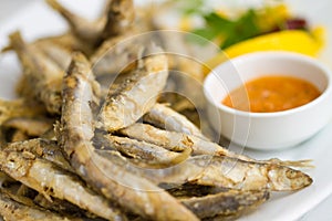 Fried sprat with souce