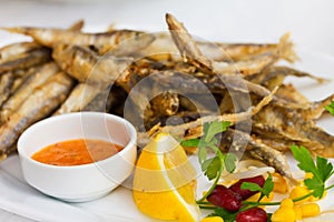 Fried sprat with souce