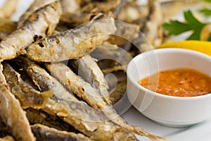 Fried sprat with souce