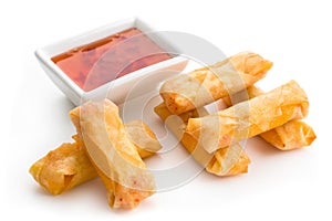 Fried spring roll Appertizers with sauce isolated on white background, close up